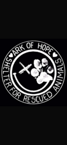 Schwarzes und weißes Logo für das Ark of Hope Shelter for Rescued Animals, mit einem Smiley mit X-Augen und einem großen Pfotenabdruck über einem Auge, umgeben vom Namen des Tierheims und Herzsymbolen.